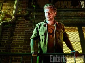 The Defenders, Finn Jones (as Iron Fist), photographed for Entertainment Weekly on December 10th, 2016, by Finlay Mackay in Brooklyn, New York. Costume Designer: Stephanie Maslansky, Wardrobe Supervisor: Pahelle Latino, Makeup Head: Sarit Klein, Key Makeup Artist: Kaela Dobson, Hair Department Head: Pamela May, FX Makeup: Brian Spears, Prop Stylist: Charlot Malmlof