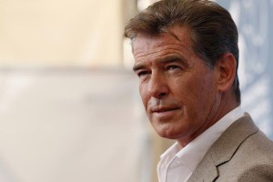 Actor Brosnan poses during photocall for the movie Den Skaldede frisor at 69th Venice Film Festival